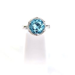 Product- 10k Gold  Blue Topaz with A Diamond Halo
