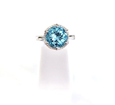 Product- 10k Gold  Blue Topaz with A Diamond Halo